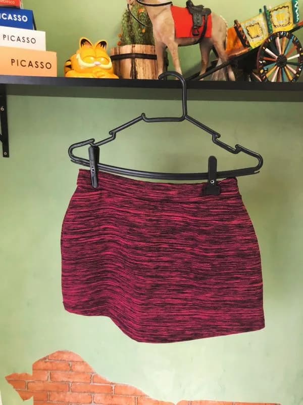 Shorts saia rosa de academia