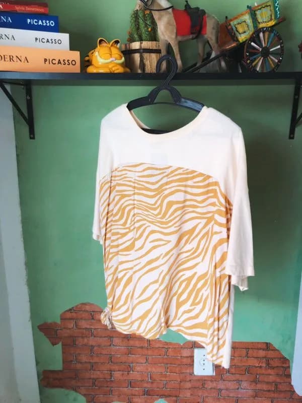 Blusa amarela animal print